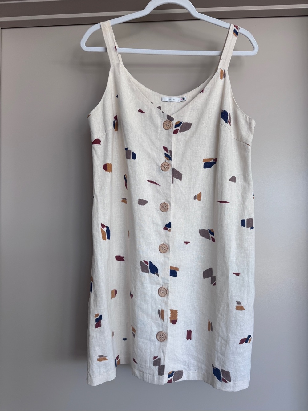 Lush Cream Mini Dress with Multicolor Abstract Spots